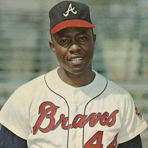 Waist-up portrait of Hank Aaron in his Atlanta Braves uniform. The print is autographed at the top.